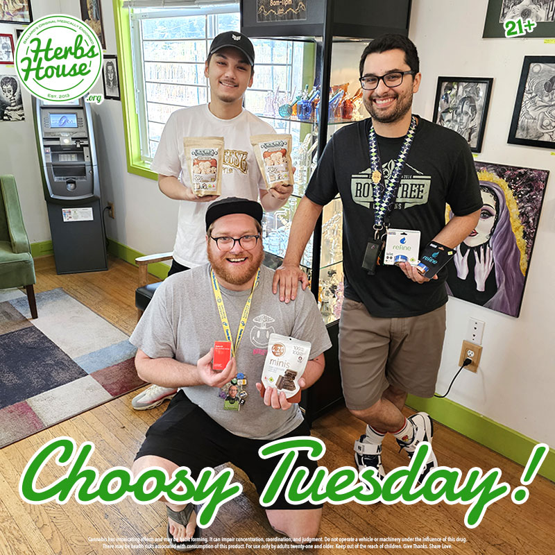 3 male members of the Herbs House Dispensary Team holding items on special for Choosy Tuesday